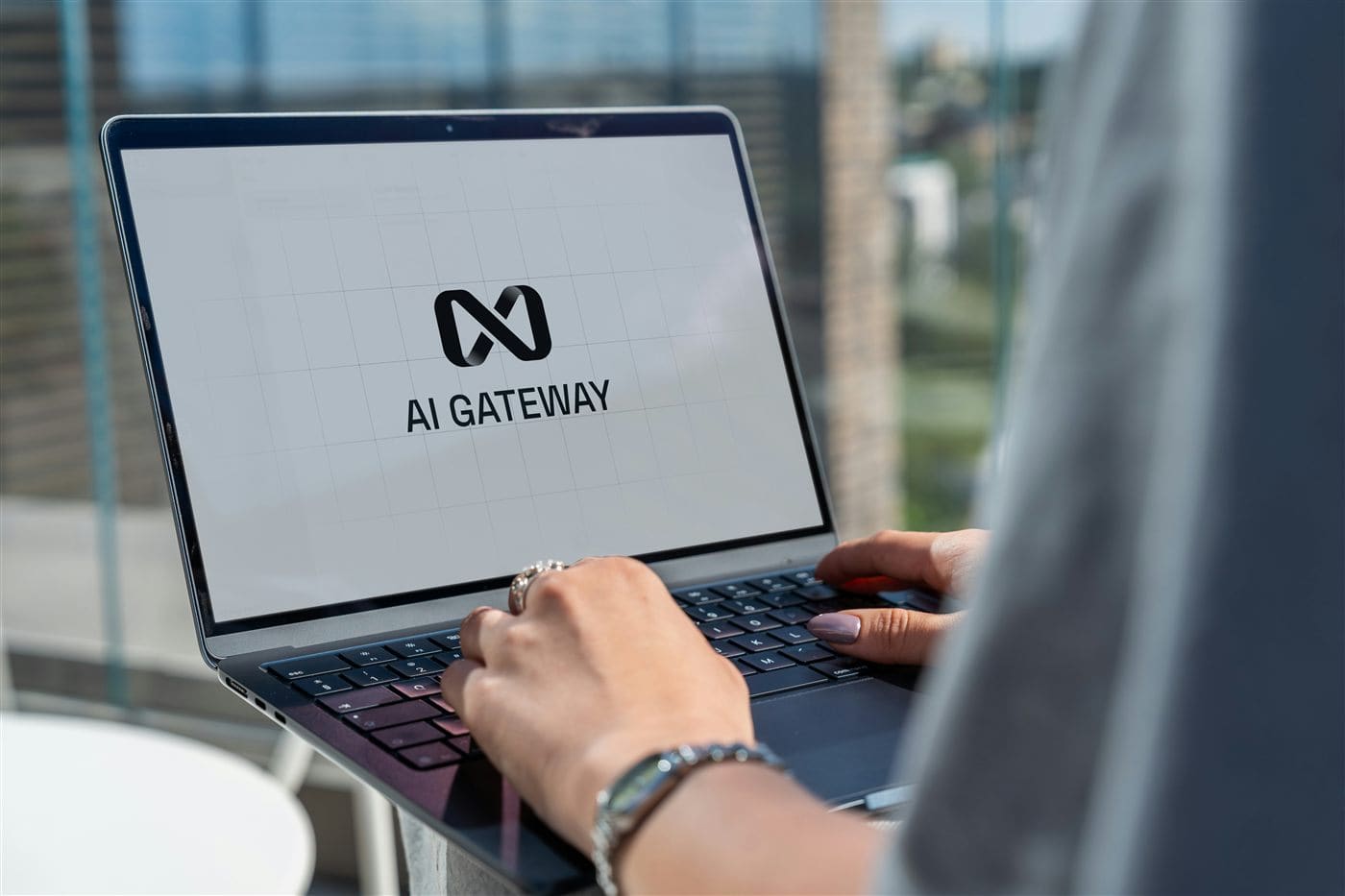 Person working with an AI assistant on a computer