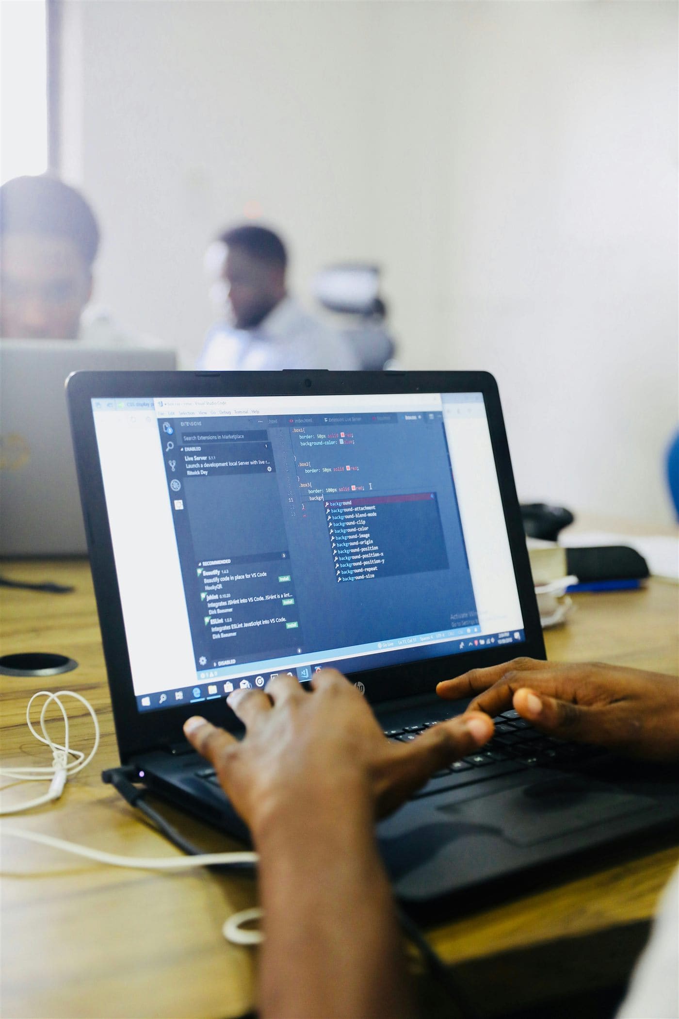 People working on a digital product with computers